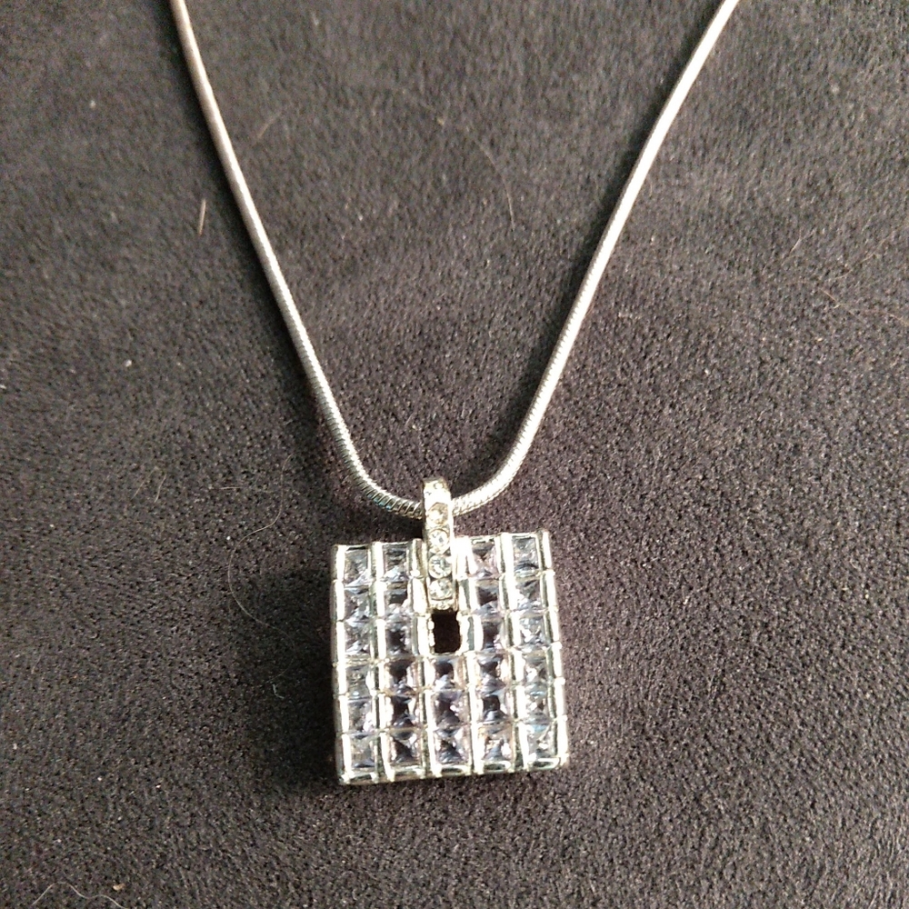 Vintage Monet silvertone with CZ rhinestones in the shape of a square